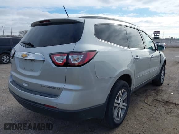 ✅ 2015 Chevrolet Traverse LT • VIN: 1GNKRHKD5FJ285351 • Lot: 43812354. Listed on IAAI with 175,066 mi. Free auction sales archive from the USA and detailed vehicle history report at DreamBid. Image 4.