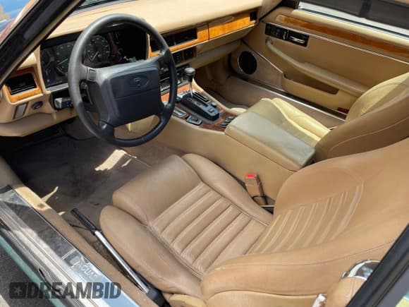 ✅ 1994 Jaguar XJS • VIN: SAJNX2743RC194705 • Lot: 67398285. Listed on Copart with 69,380 mi. Free auction sales archive from the USA and detailed vehicle history report at DreamBid. Image 9.