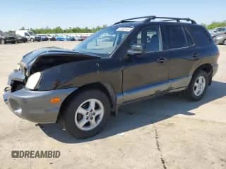 2001 Hyundai Santa Fe GLS z VIN KM8SC83D71U123474, wystawiony jako Copart lot #50665145 z przebiegiem 84 155 mil mil oraz Szkoda całkowita • Salvage title. Historia ofert i sprzedaży dostępna na DreamBid. Obrazek 1.