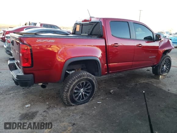 ✅ 2022 Chevrolet Colorado 4WD ZR2 • VIN: 1GCGTEEN3N1116446 • Лот: 81610903. Опубликован ранее на Copart с пробегом 12 692 миль. Бесплатный доступ к архиву аукционных продаж из США и подробный отчёт об истории автомобиля на DreamBid. Изображение 3.