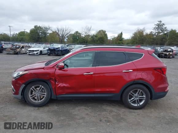 2017 Hyundai Santa Fe 2.4L z VIN 5XYZUDLB2HG385082, wystawiony jako IAAI lot #43416115 z przebiegiem Nie podano mil oraz . Historia ofert i sprzedaży dostępna na DreamBid. Obrazek 13.