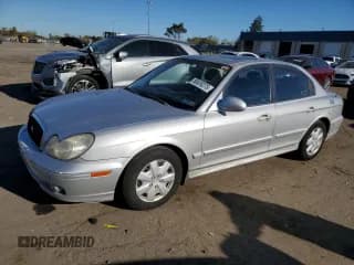 ✅ 2003 Hyundai Sonata • VIN: KMHWF25S63A721786 • Lot: 86839275. Listed on Copart with 157,279 mi. Free auction sales archive from the USA and detailed vehicle history report at DreamBid. Image 1.