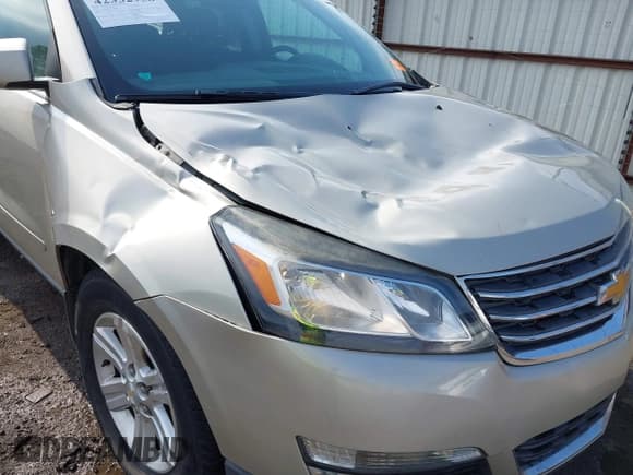 ✅ 2014 Chevrolet Traverse LT • VIN: 1GNKRHKD7EJ169048 • Lot: 42332958. Listed on IAAI with 184,819 mi. Free auction sales archive from the USA and detailed vehicle history report at DreamBid. Image 6.