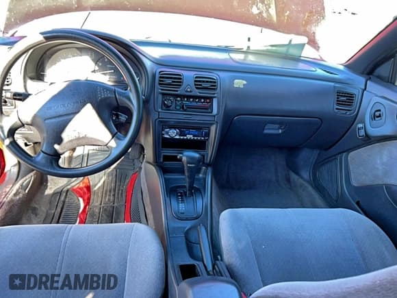 ✅ 1997 Subaru Legacy L • VIN: 4S3BD4350V7206641 • Lot: 94348765. Wystawiony na Copart z przebiegiem 195 000 mil. Bezpłatny archiwum sprzedaży aukcyjnych z USA i szczegółowy raport historii pojazdu na DreamBid. Zdjęcie 9.