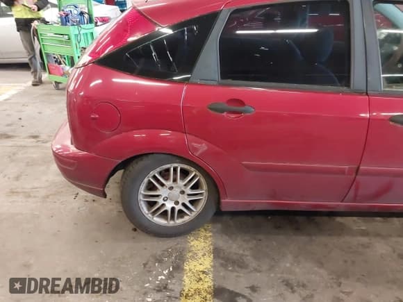 ✅ 2004 Ford Focus ZX5 • VIN: 3FAFP37394R108278 • Lot: 41482236. Listed on IAAI with 198,561 mi. Free auction sales archive from the USA and detailed vehicle history report at DreamBid. Image 6.