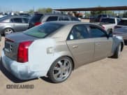 ✅ 2003 Cadillac CTS • VIN: 1G6DM57N030165770 • Lot: 42762640. Listed on IAAI with 143,599 mi. Free auction sales archive from the USA and detailed vehicle history report at DreamBid. Image 4.