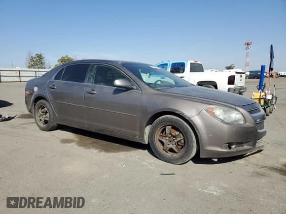 ✅ 2012 Chevrolet Malibu 1FL • VIN: 1G1ZA5E0XCF168345 • Lot: 75359894. Listed on Copart with 147,724 mi. Free auction sales archive from the USA and detailed vehicle history report at DreamBid. Image 4.
