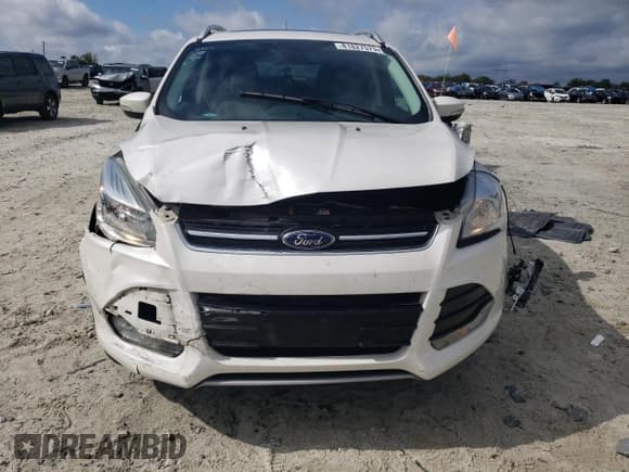 ✅ 2016 Ford Escape Titanium • VIN: 1FMCU0J96GUC04959 • Lot: 81827575. Wystawiony na Copart z przebiegiem 52 456 mil. Bezpłatny archiwum sprzedaży aukcyjnych z USA i szczegółowy raport historii pojazdu na DreamBid. Zdjęcie 5.