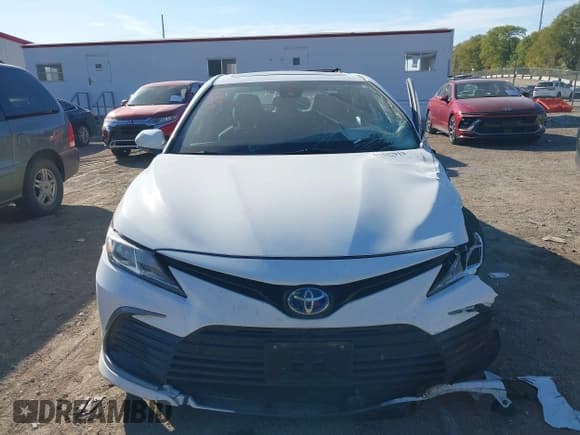 ✅ 2021 Toyota Camry Hybrid LE • VIN: 4T1H31AK3MU566826 • Лот: 43437913. Опубликован ранее на IAAI с пробегом 70 798 миль. Бесплатный доступ к архиву аукционных продаж из США и подробный отчёт об истории автомобиля на DreamBid. Изображение 12.