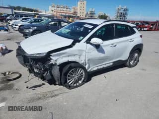 ✅ 2020 Hyundai Kona SEL • VIN: KM8K22AA9LU476343 • Лот: 89448085. Опубликован ранее на Copart с пробегом 125 185 миль. Бесплатный доступ к архиву аукционных продаж из США и подробный отчёт об истории автомобиля на DreamBid. Изображение 1.