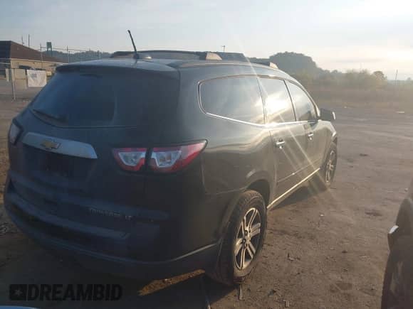 2016 Chevrolet Traverse LT with VIN 1GNKVHKD7GJ130586, listed as a IAAI auction lot 43247837 with 164,821 mi miles and . Bid and sale history available at DreamBid. Image 4.