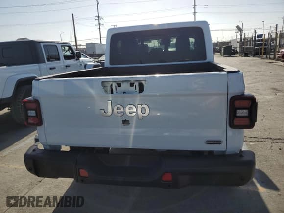 ✅ 2021 Jeep Gladiator Mojave • VIN: 1C6JJTEG6ML516867 • Lot: 61167125. Wystawiony na Copart z przebiegiem 66 709 mil. Bezpłatny archiwum sprzedaży aukcyjnych z USA i szczegółowy raport historii pojazdu na DreamBid. Zdjęcie 6.