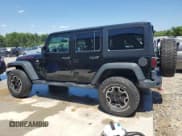 ✅ 2016 Jeep Wrangler Unlimited Rubicon Hard Rock • VIN: 1C4BJWFGXGL271881 • Lot: 57417425. Listed on Copart with 41,959 mi. Free auction sales archive from the USA and detailed vehicle history report at DreamBid. Image 2.