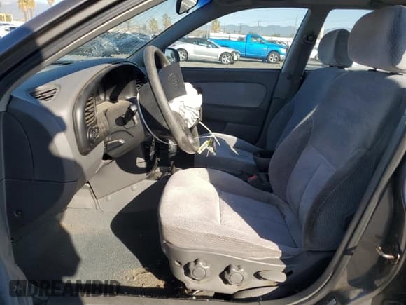 ✅ 2003 Kia Spectra • VIN: KNAFB121335277388 • Lot: 46756185. Wystawiony na Copart z przebiegiem 151 235 mil. Bezpłatny archiwum sprzedaży aukcyjnych z USA i szczegółowy raport historii pojazdu na DreamBid. Zdjęcie 7.