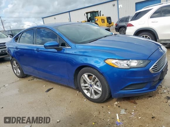✅ 2018 Ford Fusion SE • VIN: 3FA6P0H71JR114085 • Лот: 55527585. Опубликован ранее на Copart с пробегом 103 047 миль. Бесплатный доступ к архиву аукционных продаж из США и подробный отчёт об истории автомобиля на DreamBid. Изображение 4.