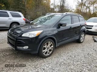 ✅ 2015 Ford Escape Titanium • VIN: 1FMCU9JX0FUB44582 • Lot: 90279025. Listed on Copart with 87,568 mi. Free auction sales archive from the USA and detailed vehicle history report at DreamBid. Image 1.