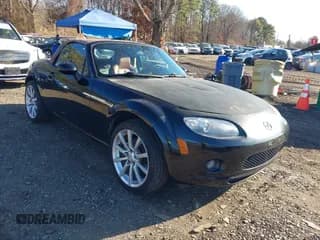 ✅ 2006 Mazda MX-5 Miata Grand Touring • VIN: JM1NC25F660102675 • Lot: 41007003. Wystawiony na IAAI z przebiegiem 129 465 mil. Bezpłatny archiwum sprzedaży aukcyjnych z USA i szczegółowy raport historii pojazdu na DreamBid. Zdjęcie 1.