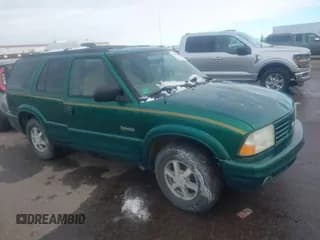 ✅ 1999 Oldsmobile Bravada • VIN: 1GHDT13W7X2711363 • Lot: 41294782. Listed on IAAI with 198,508 mi. Free auction sales archive from the USA and detailed vehicle history report at DreamBid. Image 1.