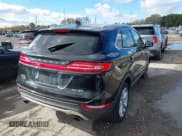 ✅ 2015 Lincoln MKC • VIN: 5LMCJ2A98FUJ19802 • Lot: 43494914. Listed on IAAI with 65,860 mi. Free auction sales archive from the USA and detailed vehicle history report at DreamBid. Image 4.