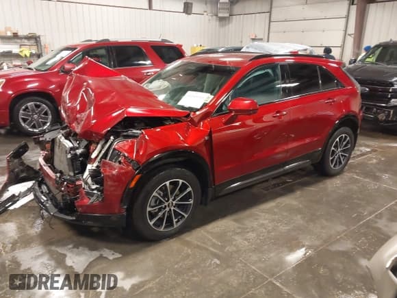 ✅ 2024 Cadillac XT4 AWD Sport • VIN: 1GYFZFR42RF154352 • Лот: 41249916. Опубликован ранее на IAAI с пробегом 27 378 миль. Бесплатный доступ к архиву аукционных продаж из США и подробный отчёт об истории автомобиля на DreamBid. Изображение 17.