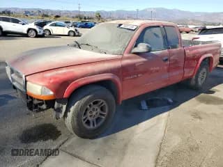 ✅ 2001 Dodge Dakota Sport • VIN: 1B7GL22N51S106573 • Lot: 79207134. Wystawiony na Copart z przebiegiem 267 965 mil. Bezpłatny archiwum sprzedaży aukcyjnych z USA i szczegółowy raport historii pojazdu na DreamBid. Zdjęcie 1.