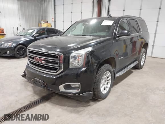 ✅ 2015 GMC Yukon SLT • VIN: 1GKS2BKC2FR509828 • Lot: 43367994. Listed on IAAI with 215,401 mi. Free auction sales archive from the USA and detailed vehicle history report at DreamBid. Image 18.