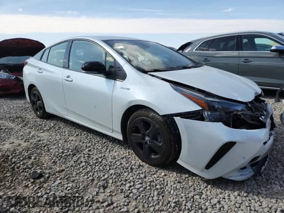 2021 Toyota Prius L Eco с VIN JTDKAMFU5M3127192, выставлен на аукционе Copart как лот 80371565 с пробегом 77 510 миль миль и Списание • Salvage title. История ставок и продаж доступна на DreamBid. Изображение 4.