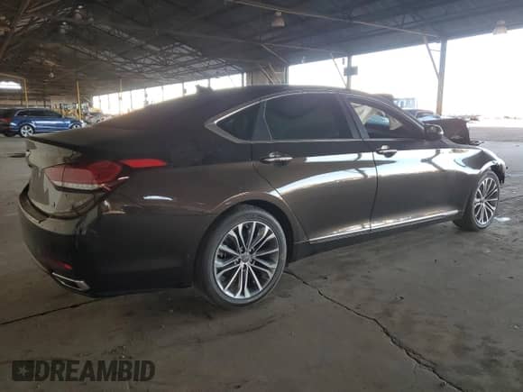 2015 Hyundai Genesis 3.8L z VIN KMHGN4JE8FU089590, wystawiony jako Copart lot #83260124 z przebiegiem 82 182 mil mil oraz Szkoda całkowita • Salvage title. Historia ofert i sprzedaży dostępna na DreamBid. Obrazek 3.