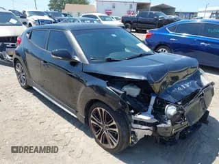 ✅ 2016 Hyundai Veloster Turbo • VIN: KMHTC6AE5GU281597 • Lot: 42006038. Wystawiony na IAAI z przebiegiem 77 642 mil. Bezpłatny archiwum sprzedaży aukcyjnych z USA i szczegółowy raport historii pojazdu na DreamBid. Zdjęcie 1.