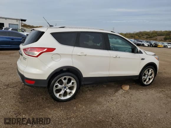 ✅ 2014 Ford Escape Titanium • VIN: 1FMCU0J94EUB57511 • Lot: 91354325. Wystawiony na Copart z przebiegiem 121 049 mil. Bezpłatny archiwum sprzedaży aukcyjnych z USA i szczegółowy raport historii pojazdu na DreamBid. Zdjęcie 3.