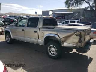 2002 Dodge Dakota SLT z VIN 1B7HG48NX2S536791, wystawiony jako Copart lot #60896504 z przebiegiem 178 827 mil mil oraz Szkoda całkowita • Salvage title. Historia ofert i sprzedaży dostępna na DreamBid. Obrazek 2.