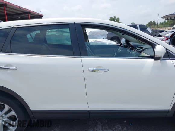 ✅ 2012 Mazda CX-9 Grand Touring • VIN: JM3TB2DA8C0359386 • Лот: 42119728. Опубликован ранее на IAAI с пробегом 170 834 миль. Бесплатный доступ к архиву аукционных продаж из США и подробный отчёт об истории автомобиля на DreamBid. Изображение 13.