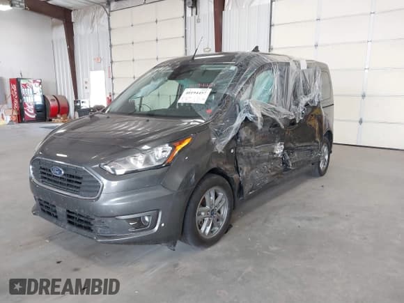 ✅ 2022 Ford Transit Connect XLT • VIN: NM0GE9F24N1543380 • Lot: 40194457. Listed on IAAI with 26,050 mi. Free auction sales archive from the USA and detailed vehicle history report at DreamBid. Image 2.