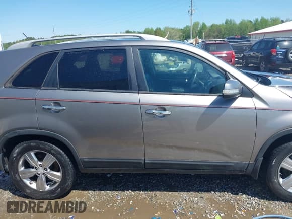 ✅ 2013 Kia Sorento EX • VIN: 5XYKU4A27DG394164 • Lot: 41949711. Listed on IAAI with 213,407 mi. Free auction sales archive from the USA and detailed vehicle history report at DreamBid. Image 12.