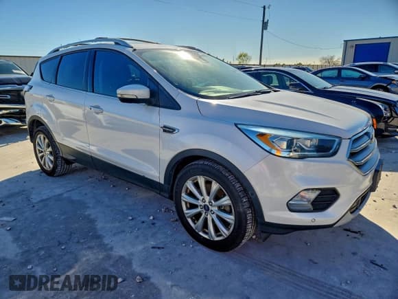 ✅ 2017 Ford Escape Titanium • VIN: 1FMCU0J98HUD10069 • Лот: 94386305. Опубликован ранее на Copart с пробегом 138 255 миль. Бесплатный доступ к архиву аукционных продаж из США и подробный отчёт об истории автомобиля на DreamBid. Изображение 4.