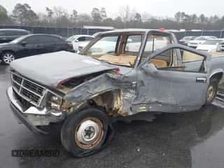 1987 Dodge Dakota z VIN 1B7GN14M0HS416892, wystawiony jako IAAI lot #41751330 z przebiegiem 102 958 mil mil oraz . Historia ofert i sprzedaży dostępna na DreamBid. Obrazek 6.