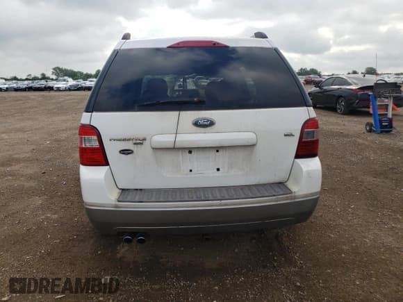 ✅ 2005 Ford Freestyle SEL • VIN: 1FMZK05105GA41001 • Лот: 68325235. Опубликован ранее на Copart с пробегом Не указан. Бесплатный доступ к архиву аукционных продаж из США и подробный отчёт об истории автомобиля на DreamBid. Изображение 6.
