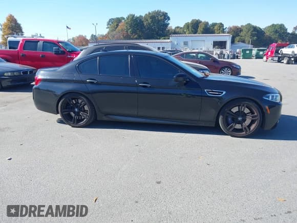 ✅ 2016 BMW M5 • VIN: WBSFV9C51GG343384 • Lot: 43477492. Listed on IAAI with 52,385 mi. Free auction sales archive from the USA and detailed vehicle history report at DreamBid. Image 13.