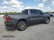 ✅ 2021 Ram 1500 Laramie • VIN: 1C6SRFJT1MN823742 • Lot: 81774025. Listed on Copart with 103,757 mi. Free auction sales archive from the USA and detailed vehicle history report at DreamBid. Image 3.