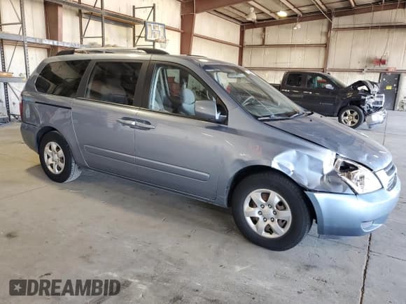 ✅ 2009 Kia Sedona EX • VIN: KNDMB233796317121 • Lot: 84377965. Listed on Copart with 239,853 mi. Free auction sales archive from the USA and detailed vehicle history report at DreamBid. Image 4.