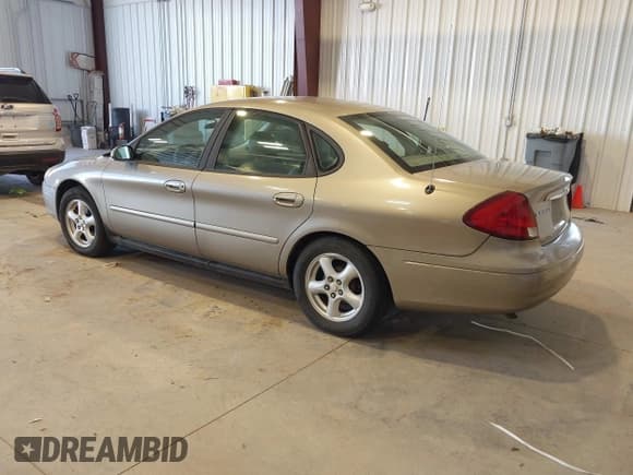 ✅ 2003 Ford Taurus SES Standard • VIN: 1FAFP55U83A125542 • Lot: 43348674. Listed on IAAI with 151,835 mi. Free auction sales archive from the USA and detailed vehicle history report at DreamBid. Image 3.