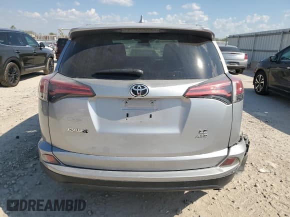 ✅ 2018 Toyota RAV4 LE • VIN: 2T3BFREV0JW709704 • Lot: 84770675. Listed on Copart with 137,937 mi. Free auction sales archive from the USA and detailed vehicle history report at DreamBid. Image 6.