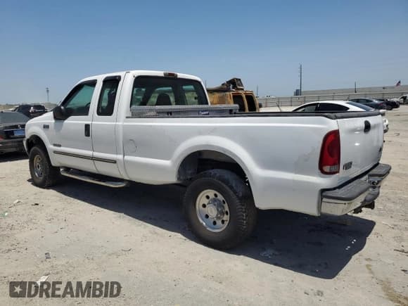 ✅ 2000 Ford F-250 XL • VIN: 1FTNX21F0YED32261 • Lot: 57243325. Wystawiony na Copart z przebiegiem 306 868 mil. Bezpłatny archiwum sprzedaży aukcyjnych z USA i szczegółowy raport historii pojazdu na DreamBid. Zdjęcie 2.