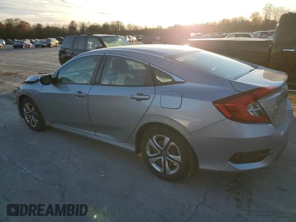✅ 2018 Honda Civic LX • VIN: 2HGFC2F59JH572022 • Lot: 92903575. Listed on Copart with 124,610 mi. Free auction sales archive from the USA and detailed vehicle history report at DreamBid. Image 2.