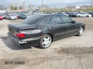 ✅ 2001 Mercedes-Benz E 320 • VIN: WDBJF70J51B232005 • Lot: 41912486. Listed on IAAI with 148,485 mi. Free auction sales archive from the USA and detailed vehicle history report at DreamBid. Image 4.