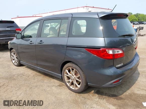 ✅ 2012 Mazda 5 Touring • VIN: JM1CW2CL5C0126744 • Lot: 42385667. Listed on IAAI with 140,150 mi. Free auction sales archive from the USA and detailed vehicle history report at DreamBid. Image 3.