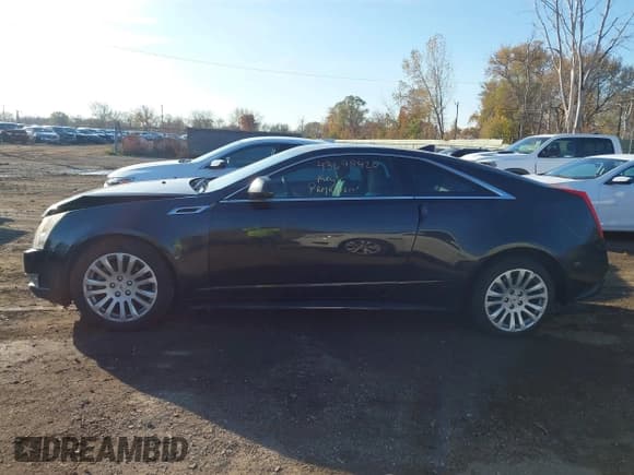 ✅ 2014 Cadillac CTS Performance • VIN: 1G6DG1E35E0169673 • Lot: 43698420. Listed on IAAI with 84,034 mi. Free auction sales archive from the USA and detailed vehicle history report at DreamBid. Image 14.