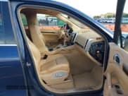 ✅ 2012 Porsche Cayenne S Hybrid • VIN: WP1AE2A28CLA90940 • Lot: 43355033. Listed on IAAI with 163,745 mi. Free auction sales archive from the USA and detailed vehicle history report at DreamBid. Image 5.