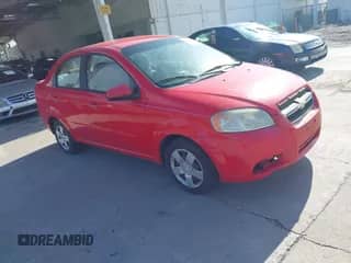 2011 Chevrolet Aveo 1LT z VIN KL1TD5DE3BB164104, wystawiony jako IAAI lot #42567630 z przebiegiem 171 408 mil mil oraz . Historia ofert i sprzedaży dostępna na DreamBid. Obrazek 1.