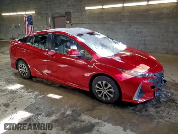 ✅ 2021 Toyota Prius XLE • VIN: JTDKAMFP0M3175029 • Lot: 95424545. Listed on Copart with 52,953 mi. Free auction sales archive from the USA and detailed vehicle history report at DreamBid. Image 4.